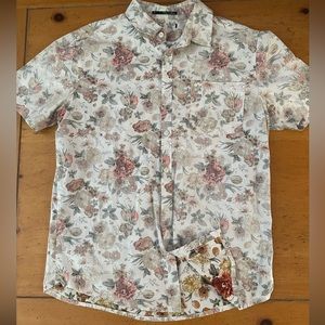 Floral shirt.